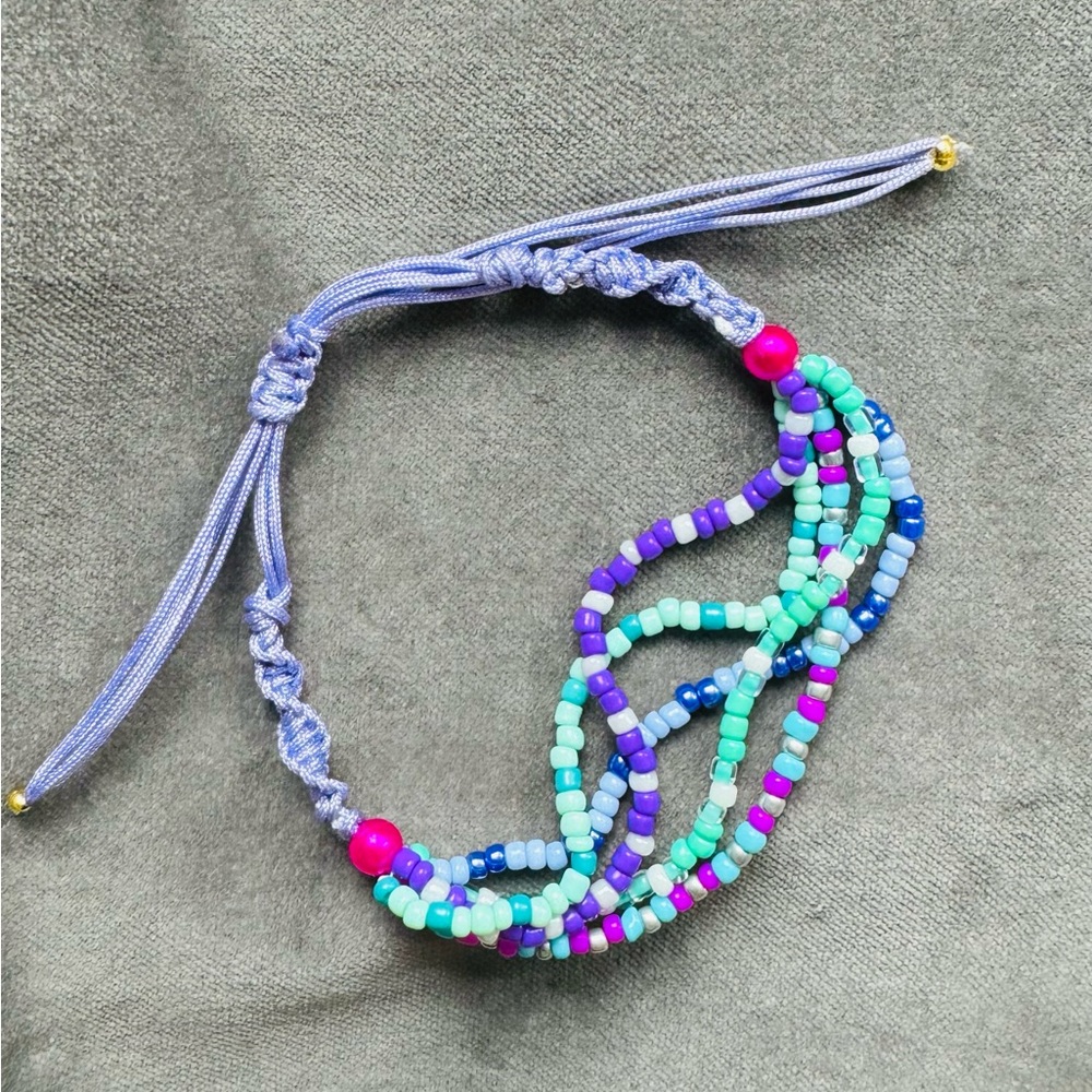 5 strand beaded bracelet on silk cord